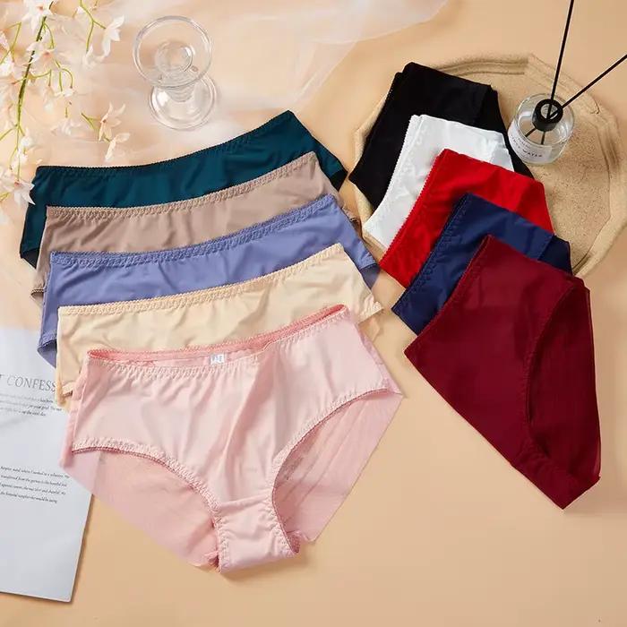 Femmes taille moyenne culottes Sexy Transparent sous-vêtements élastiques dames sans couture mince slips femme