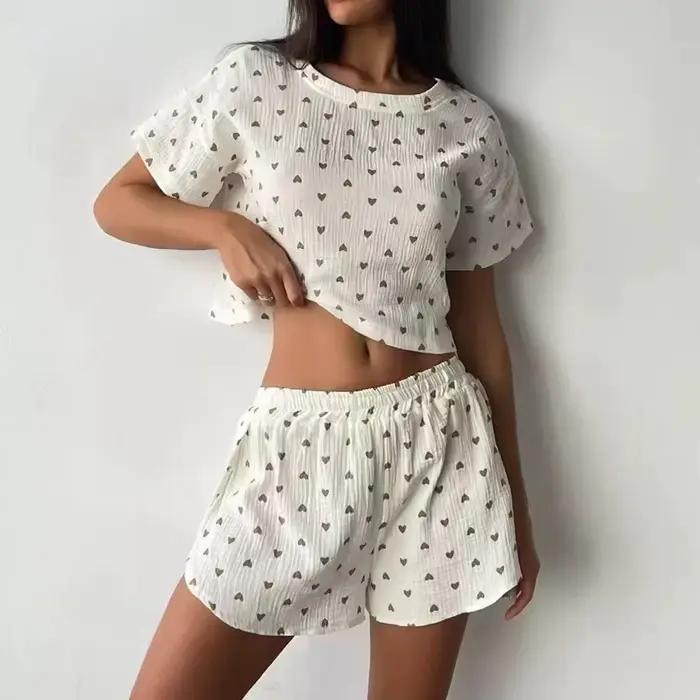 Nouveaux pyjamas décontractés pour femmes, imprimés cœurs, en coton doux et confortable, avec short et t-shirt ample à découpe nombril, très demandés