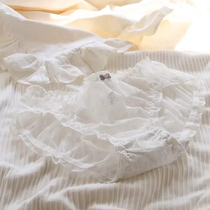 Sous-vêtements féminins en dentelle nylon fleur taille moyenne culotte rapide séchage et respirable à offrir pour femmes occasions spéciales