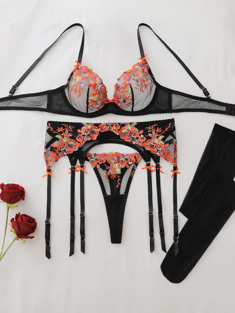 Ensemble de lingerie sculptante transparente à broderie florale de luxe 4 pièces avec bas cuissardes