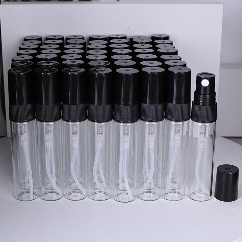 Flcopropriété de parfum en verre transparent de haute qualité, d'extraction pulvérisateur, mini port