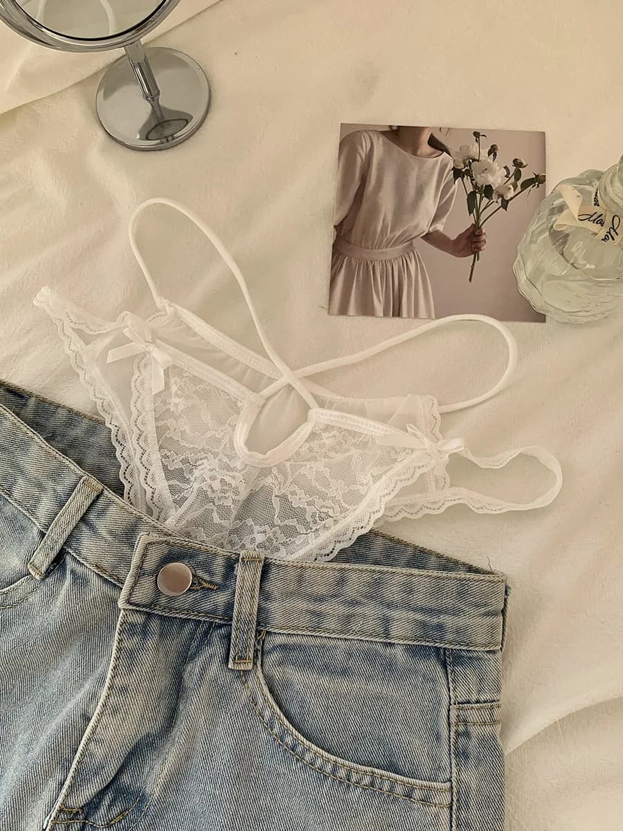 Nouvelles femmes taille basse culotte dentelle pure évider nœud papillon Sexy confortable été mince 