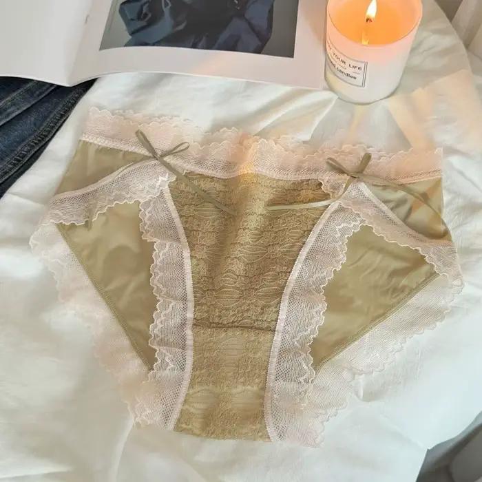 Culottes en dentelle taille basse avec nœud en soie glacée et maille