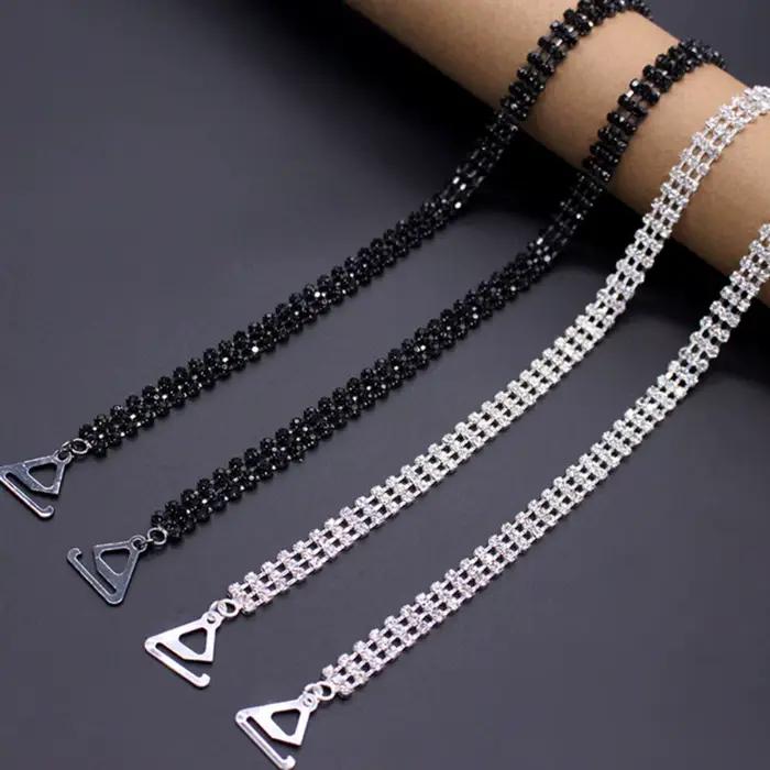 1 paire de bretelles de soutien-gorge métalliques noires et argentées