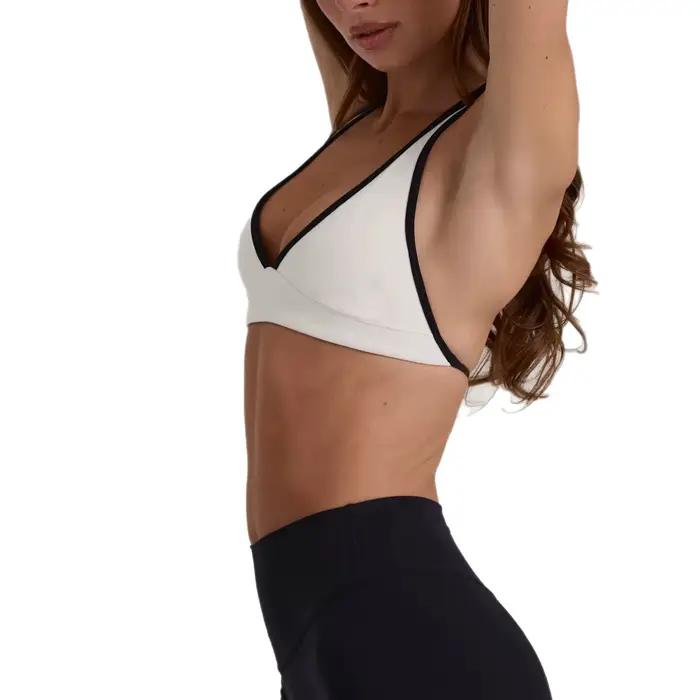 Soutien-gorge de sport moulant avec coussinets de poitrine, dos élégant, pli central avant, col halter, pour le fitness et la course à pied