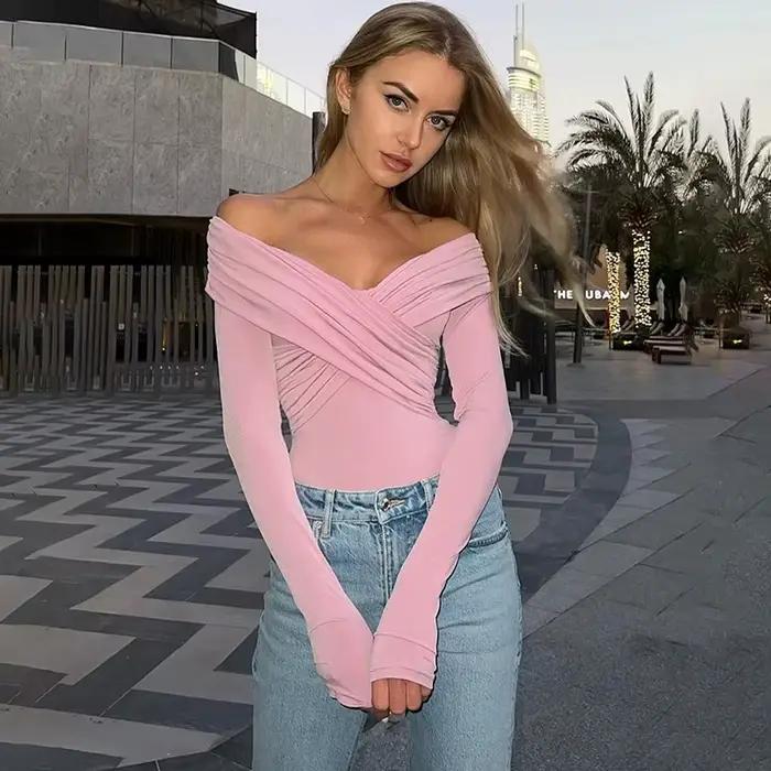 Nouveaux Bodys pour femmes Automne Sexy Dos nu Uni Corset Ajusté Mode Croisé Manches longues Décontracté Élégant