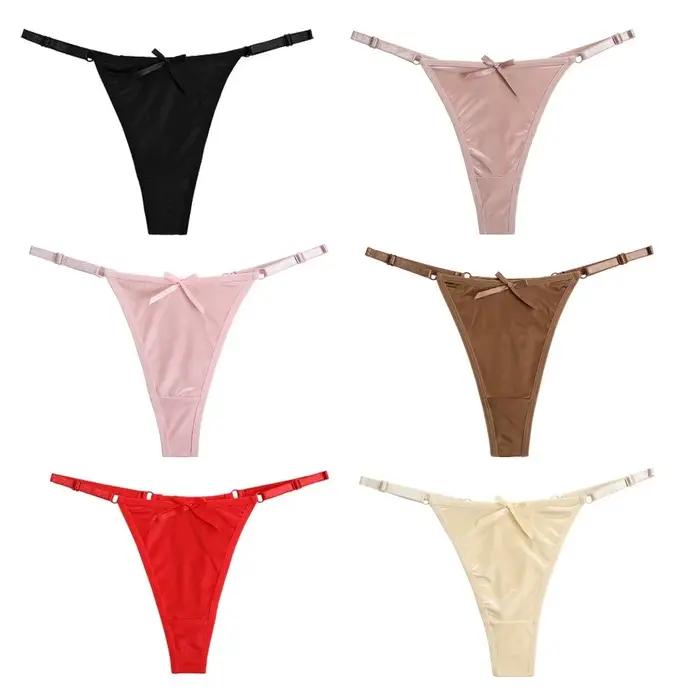 String T-back taille basse en satin transparent avec nœud