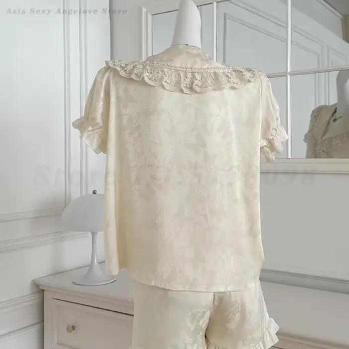 Manches courtes pyjama costume Satin vêtements de nuit boutonné haut et Short de luxe dentelle col en v
