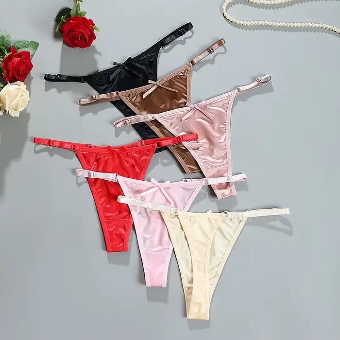 String T-back taille basse en satin transparent avec nœud
