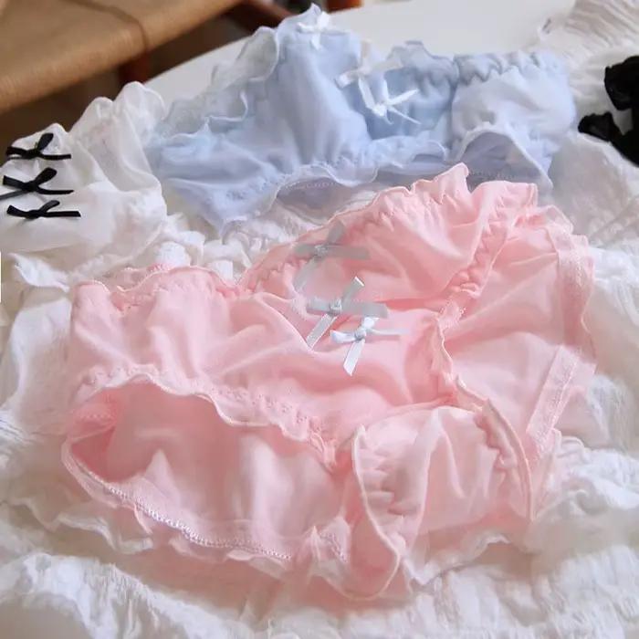 Culotte femme taille moyenne en dentelle respirante perforée avec nœud papillon