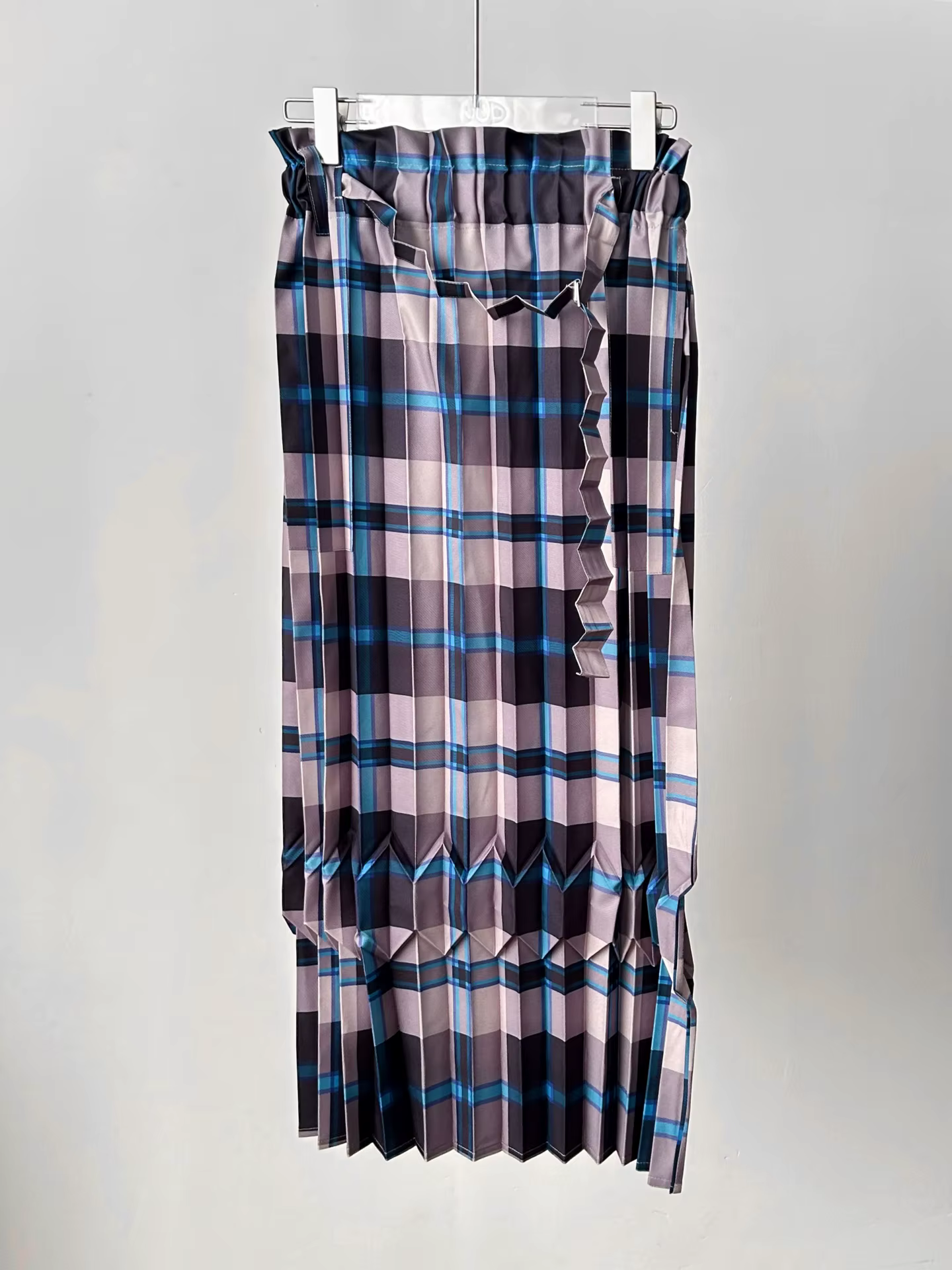 Jupe plissée asymétrique à carreaux bleu et noir, jupe à volants, style rétro moderne chic, tendance
