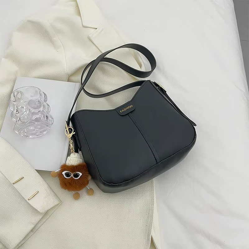 Sac seau confortable et polyvalent avec design ergonomique pour les voyageurs