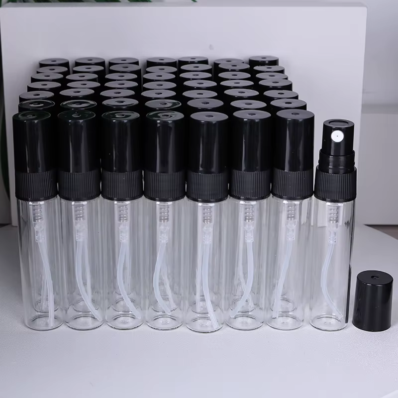 Flcopropriété de parfum en verre transparent de haute qualité, d'extraction pulvérisateur, mini port